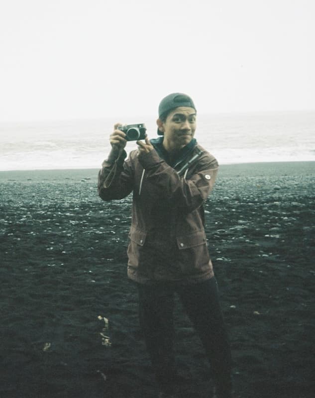 dorky photo of Son holding a camera